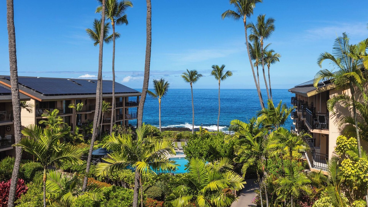 Kailua-Kona Condo | LAST MINUTE DISCOUNT SPECIALS! End Unit. Direct Ocean View. Wrap-Around Lanai.