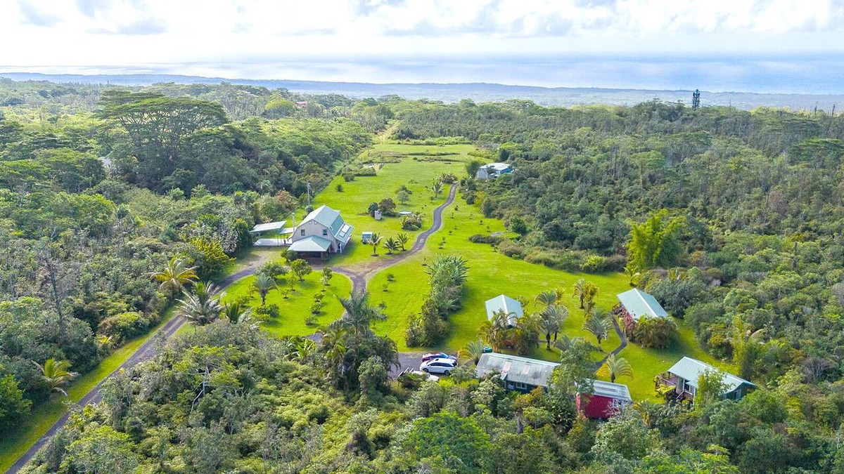 Pahoa House | Ocean View Estate with private hiking trail and volcanically heated hot tubs.