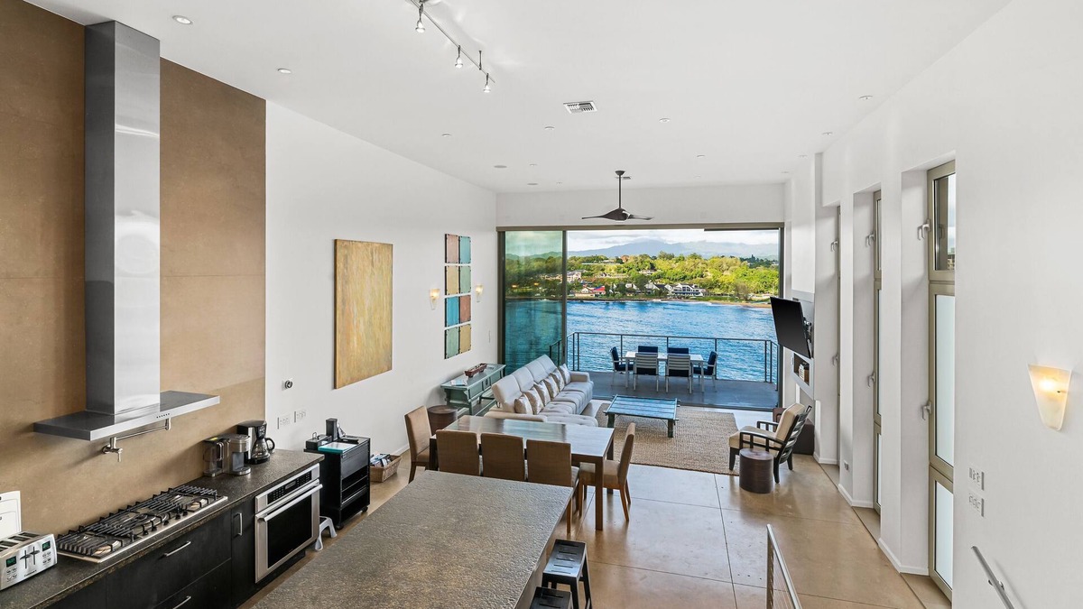 Lihue Apartment | Stunning Oceanfront Penthouse, 14' ft Ceilings and Wall-to-Wall Glass Slider.