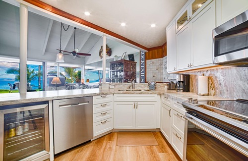 Kihei Condo | Beachfront Bungalow with Stunning Ocean Views at Hale Pau Hana on Kam II Beach.