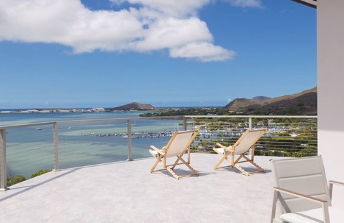 Kaneohe House | Elegant luxurious hillside retreat with awe inspiring panoramic ocean and mountain views. 90 day minimum rental.