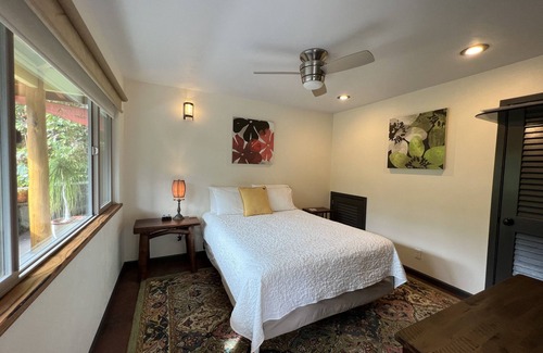 Hilo House | Jungle view bedroom with private entrance,outdoor private Bali style bathroom