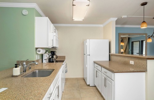 Poipu Condo | Summer Deal Oceanfront Poipu Condo with Heated Pool and Lanai