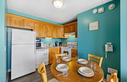 McCully - Moiliili Condo | Total of 2 bedrooms at Royal Kuhio, Sleeps 8, with AC. Two units, same floor,