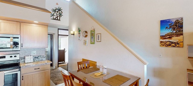 Dog-friendly condo with furnished lanai & washer/dryer plus pool & tennis