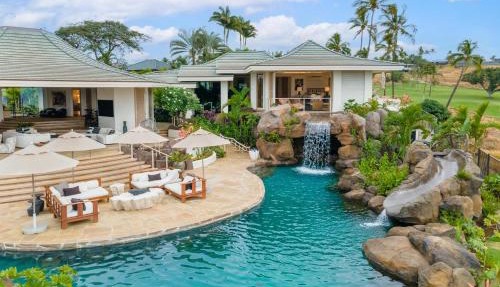 Experience luxury at Hale 'O Ka La in Kamuela, featuring 5 bedrooms and stunning amenities.