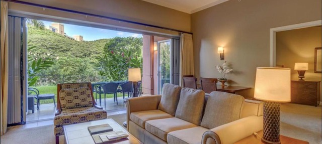 GROUND FLOOR DIRECT ACCESS with private outdoor yard space luxury resort condo