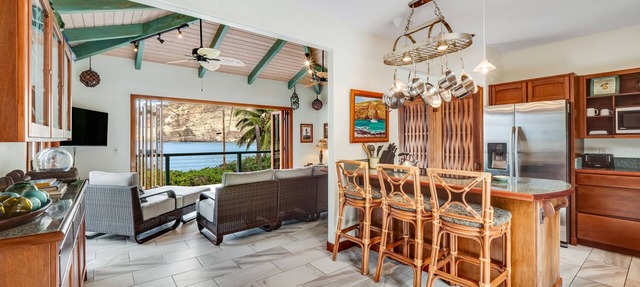 Oceanfront sanctuary with light-filled interior, lanai, W/D, & full kitchen