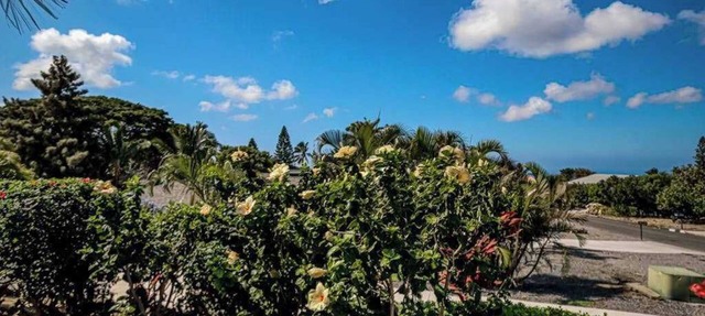 Walk to Golf From an Updated Home with Pools, Lanai & Ocean View