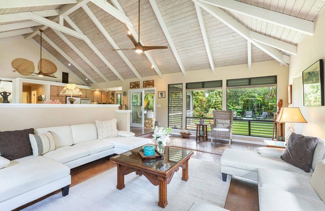 Walk to the beach in this lush, serene house with a private garden oasis