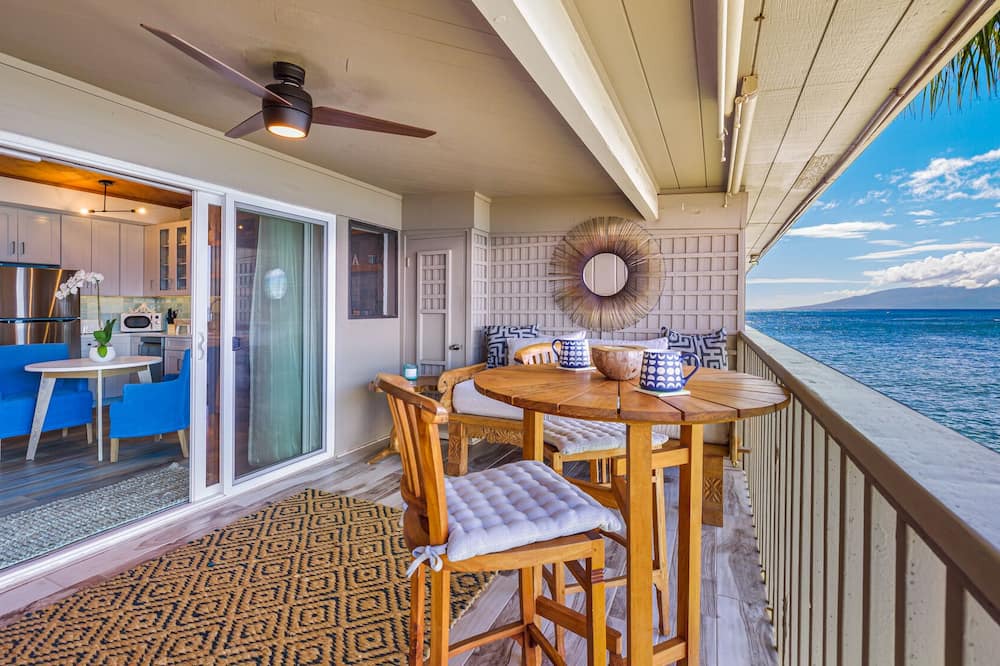 Kahana Condo | Chic Island Living overlooking ocean-Pohailani 210-Comfy Lanai daybed-Cold AC