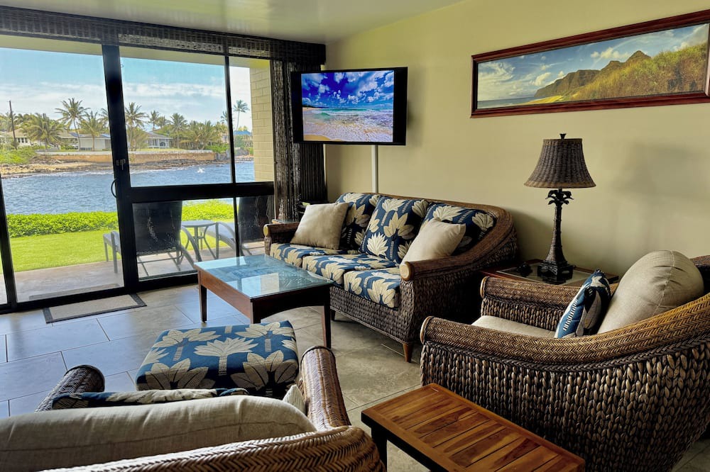 Poipu Condo | Fully Renovated Oceanfront with Air Cond. Ground Floor Unit with Spacious Lanai!