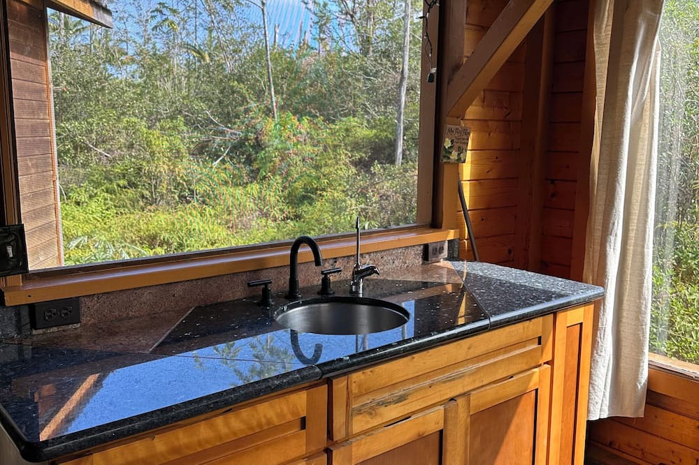 Orchidlands Estates Cabin | Glam camping in a private artistic solar eco-cabin