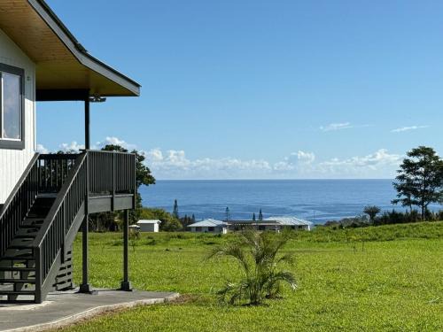 Honomu House | Luxury Farm Stay with Hot Tub, Cold Plunge and Cuddle Cows