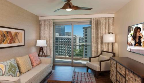 One-Bedroom Suite with Two Double Beds and Partial Ocean View