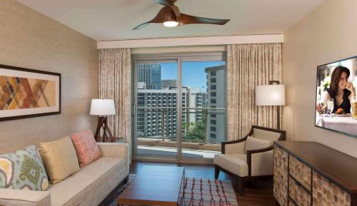 One-Bedroom Suite with Two Double Beds and Partial Ocean View