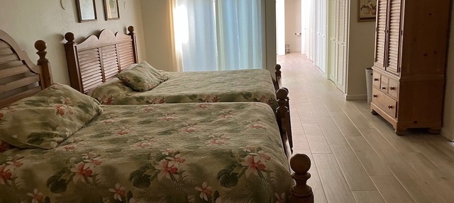 Refreshed & spacious 5 br. Home designed for large groups is only steps to sand