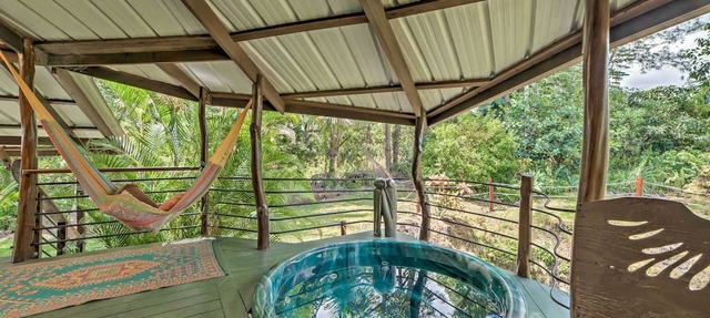 Tropical Cabana w/Deck, Hot Tub & Lush Scenery!