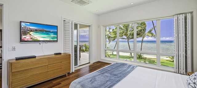 Luxurious Beach Front North Shore Home with Panoramic Ocean Views