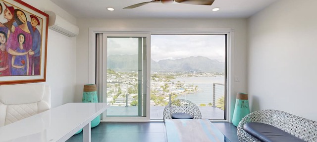 Luxurious modern home with multiple lanais, private elevator & views throughout