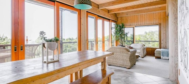 Sweeping Views from a Striking Home with Balconies