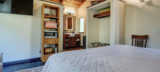Escape to your private oasis perched on a cliff with a jungle view