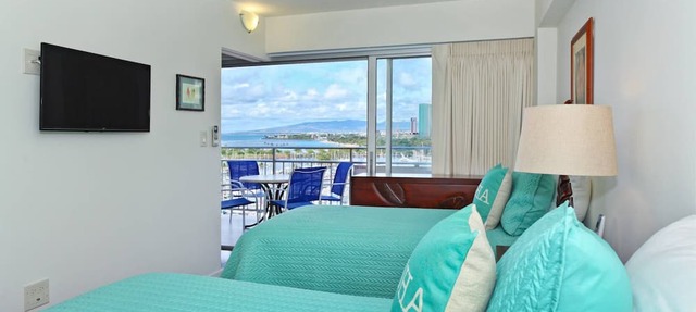 BEAUTIFUL Ilikai suite w/Ocean, Marina & Sunset Views! Large Lanai! Parking!