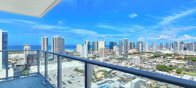 Serene High-Rise Escape with Ocean Views & Sunset