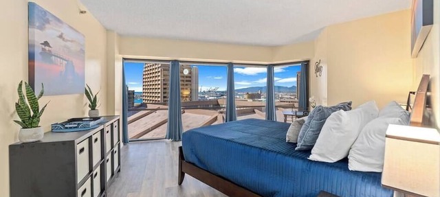16th Fl Executive Center 1BR Condo | Parking | Pool | City View